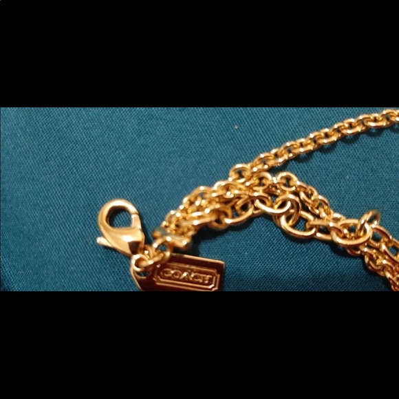 Beautiful coach golden colour necklace . - Picture 4 of 12